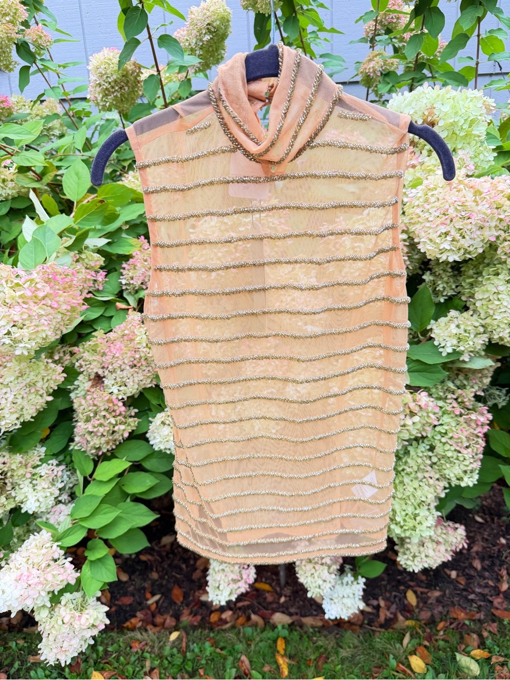 Sleeveless Peach Turtleneck tank with Metallic Trim